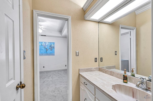 6415 San Mateo Ln, Odessa, TX 79762 - bathroom featuring vanity and a textured wall