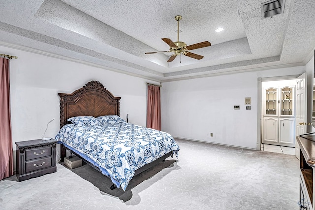 6415 San Mateo Ln, Odessa, TX 79762 - bedroom with a raised ceiling, light colored carpet, a ceiling fan, and recessed lighting
