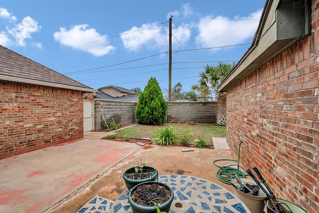 6415 San Mateo Ln, Odessa, TX 79762 - fenced backyard featuring a patio