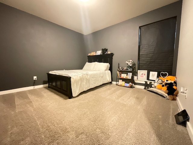 1311 Red Cliff Ave, Odessa, TX 79765 - carpeted bedroom featuring baseboards and lofted ceiling