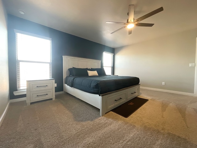 1311 Red Cliff Ave, Odessa, TX 79765 - carpeted bedroom with lofted ceiling and ceiling fan