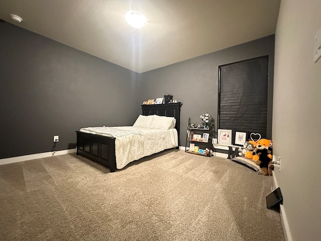 1311 Red Cliff Ave, Odessa, TX 79765 - carpeted bedroom with baseboards and lofted ceiling
