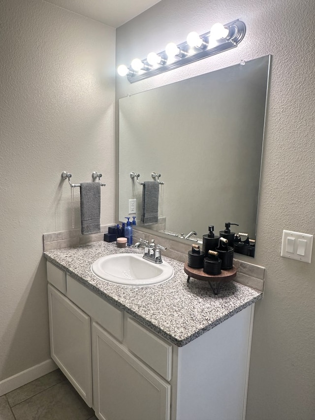 1311 Red Cliff Ave, Odessa, TX 79765 - bathroom with vanity and tile patterned floors
