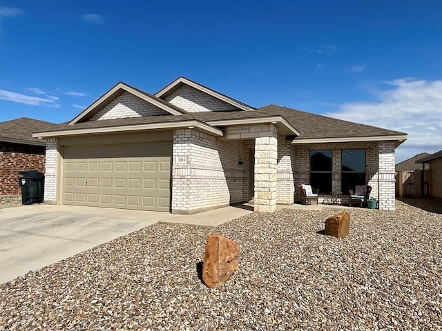 1311 Red Cliff Ave, Odessa, TX 79765 - ranch-style home with an attached garage, driveway, brick siding, and roof with shingles