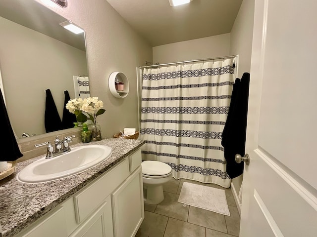 1311 Red Cliff Ave, Odessa, TX 79765 - bathroom featuring vanity, tile patterned flooring, and a shower with curtain