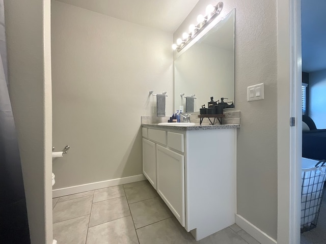 1311 Red Cliff Ave, Odessa, TX 79765 - bathroom with vanity and tile patterned flooring