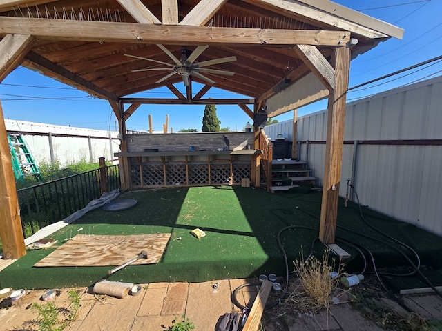3613 Locust Ave, Odessa, TX 79762 - fenced backyard featuring a gazebo and ceiling fan