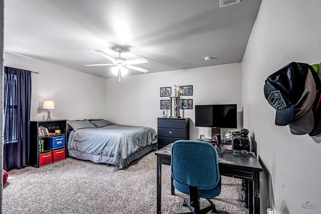 811 E 97th Ct, Odessa, TX 79765 - bedroom featuring carpet, ceiling fan, and a desk