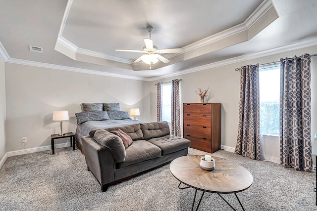 811 E 97th Ct, Odessa, TX 79765 - carpeted bedroom featuring a raised ceiling, baseboards, crown molding, and ceiling fan