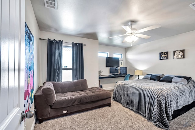 811 E 97th Ct, Odessa, TX 79765 - bedroom featuring carpet flooring and a ceiling fan