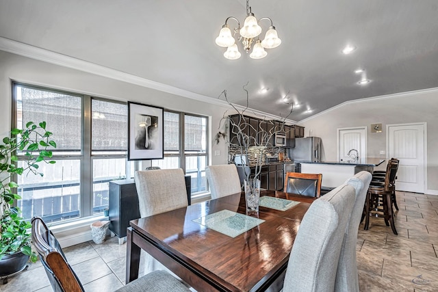 811 E 97th Ct, Odessa, TX 79765 - dining space with ornamental molding, a chandelier, lofted ceiling, and baseboards