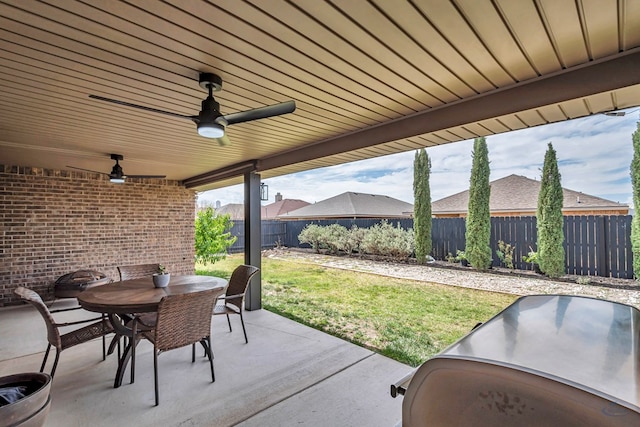 811 E 97th Ct, Odessa, TX 79765 - view of patio with outdoor dining space and a ceiling fan