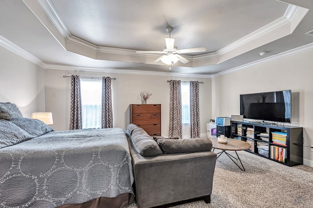 811 E 97th Ct, Odessa, TX 79765 - bedroom featuring a raised ceiling, crown molding, carpet flooring, and ceiling fan