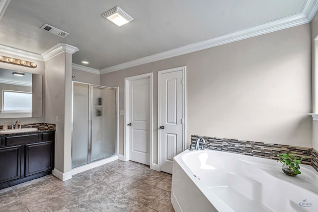 811 E 97th Ct, Odessa, TX 79765 - full bathroom featuring ornamental molding, a stall shower, a garden tub, vanity, and baseboards