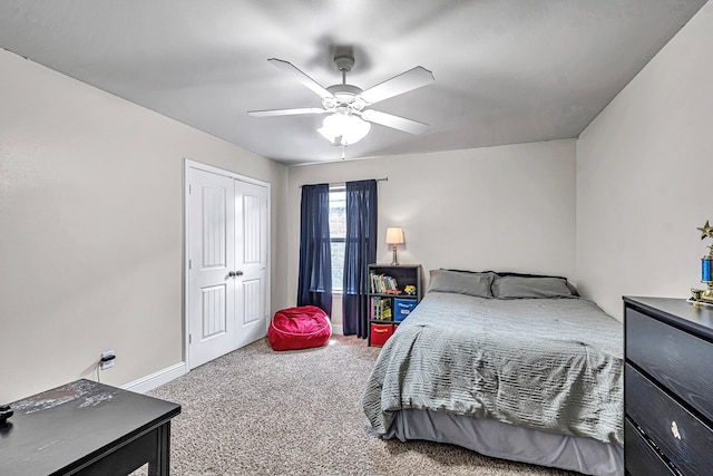 811 E 97th Ct, Odessa, TX 79765 - bedroom with carpet, a closet, and a ceiling fan