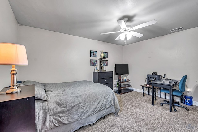 811 E 97th Ct, Odessa, TX 79765 - bedroom featuring carpet floors, an office area, baseboards, and a ceiling fan
