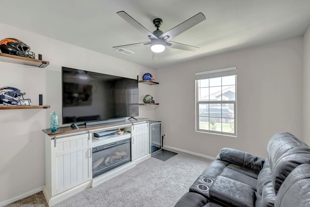8409 E County Rd 115, Midland, TX 79706 - living area featuring light colored carpet, ceiling fan, and baseboards