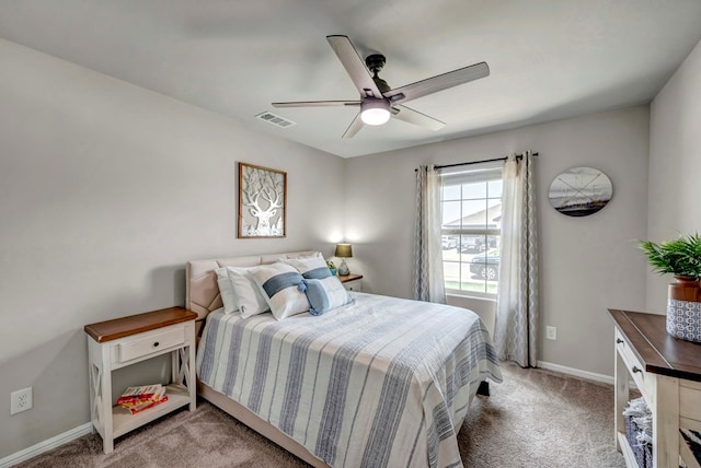 8409 E County Rd 115, Midland, TX 79706 - bedroom featuring carpet flooring, baseboards, and ceiling fan