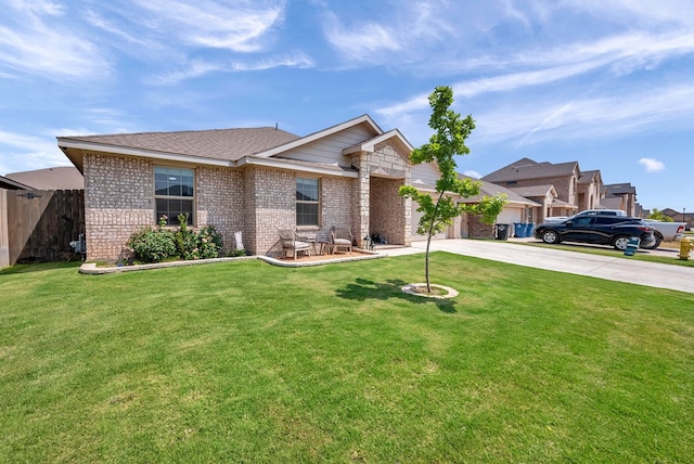 8409 E County Rd 115, Midland, TX 79706 - ranch-style house featuring brick siding, concrete driveway, a garage, and a shingled roof