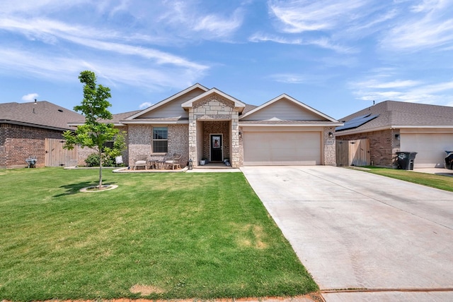 8409 E County Rd 115, Midland, TX 79706 - ranch-style home featuring an attached garage, driveway, brick siding, and stone siding