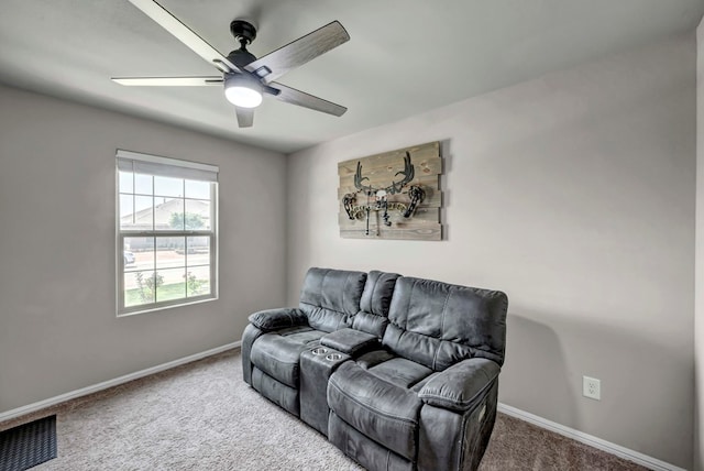 8409 E County Rd 115, Midland, TX 79706 - carpeted living room with baseboards and a ceiling fan