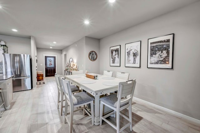 8409 E County Rd 115, Midland, TX 79706 - dining room with recessed lighting, light wood finished floors, and baseboards