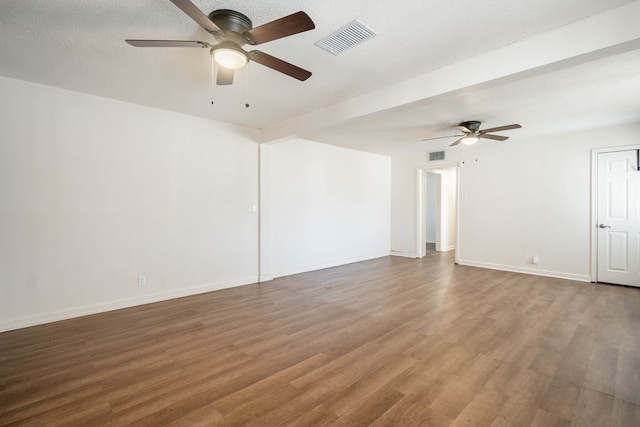 309 SW 10th St, Andrews, TX 79714 - unfurnished room with ceiling fan and wood finished floors