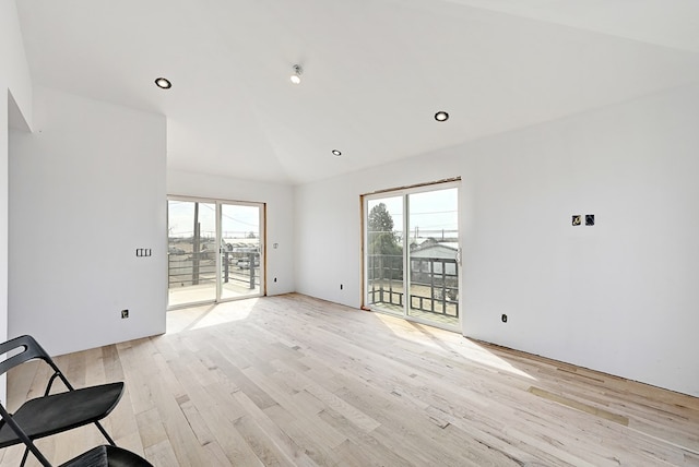1007 E Texas St, Marfa, TX 79843 - unfurnished living room with light wood-type flooring, healthy amount of natural light, and recessed lighting