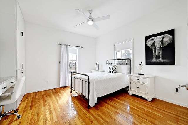 1007 E Texas St, Marfa, TX 79843 - bedroom with light wood-style floors, baseboards, and a ceiling fan