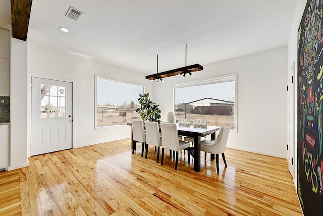 1007 E Texas St, Marfa, TX 79843 - dining area with light wood-style floors, recessed lighting, and baseboards