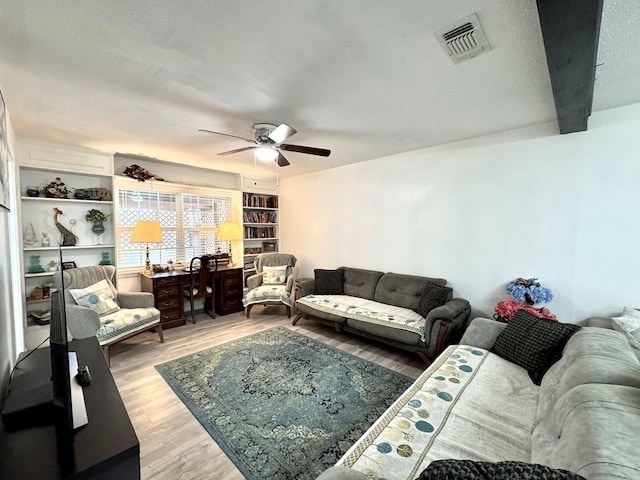 503 E Hendryx Ave, Alpine, TX 79830 - living area with ceiling fan and wood finished floors