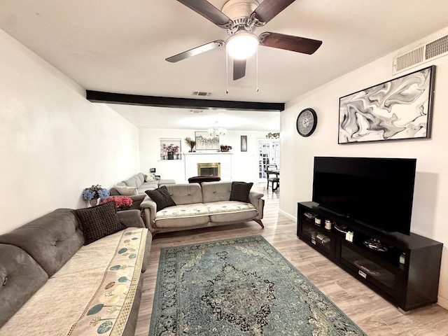 503 E Hendryx Ave, Alpine, TX 79830 - living area featuring ceiling fan and light wood-style flooring