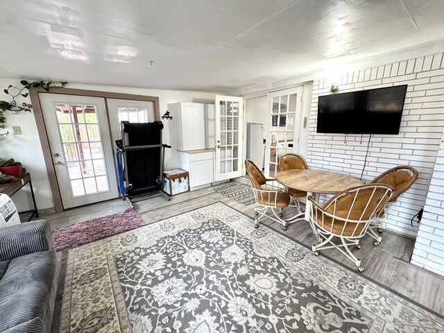 503 E Hendryx Ave, Alpine, TX 79830 - living room with light wood finished floors and french doors