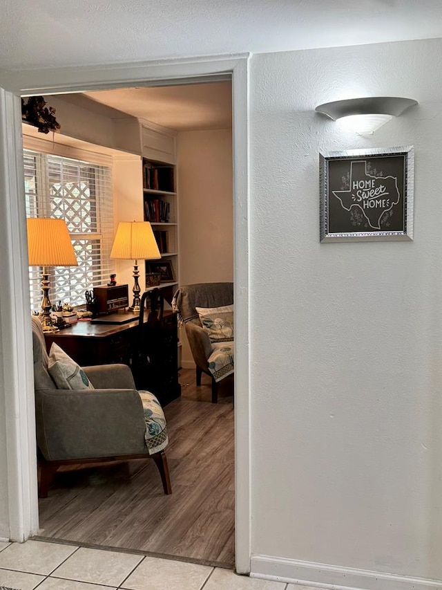 503 E Hendryx Ave, Alpine, TX 79830 - hall featuring light tile patterned floors and built in features