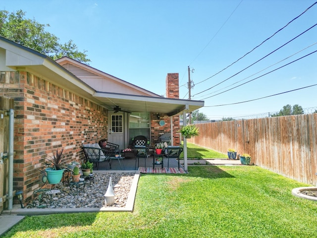 1847 Cody Pl, Odessa, TX 79762 - view of yard with ceiling fan and a patio