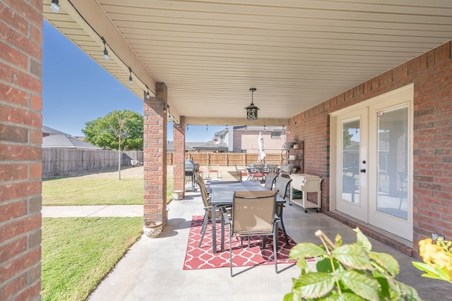 view of patio featuring french doors