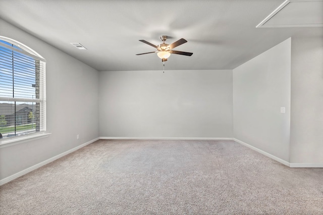 3102 Mearns Ct, Midland, TX 79705 - carpeted empty room with attic access and a ceiling fan