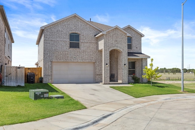 3102 Mearns Ct, Midland, TX 79705 - traditional-style house featuring brick siding, a garage, and driveway