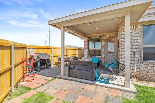 3102 Mearns Ct, Midland, TX 79705 - fenced backyard featuring a patio area and an outdoor living space