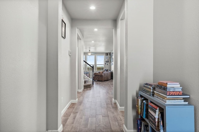 3102 Mearns Ct, Midland, TX 79705 - hall with light wood finished floors, stairs, and recessed lighting