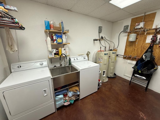 735 S Front St, Fort Davis, TX 79734 - washroom featuring water heater and washing machine and dryer