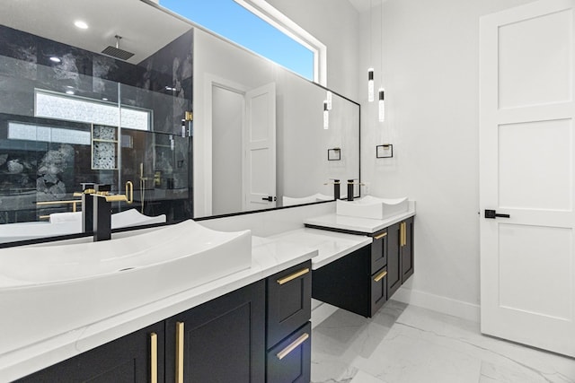 8652 Fiesta Ct, Odessa, TX 79765 - bathroom featuring vanity, a stall shower, and marble finish floors