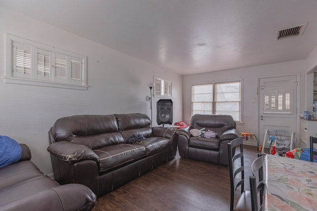 900 N Dotsy Ave, Odessa, TX 79763 - living area with dark wood-style flooring