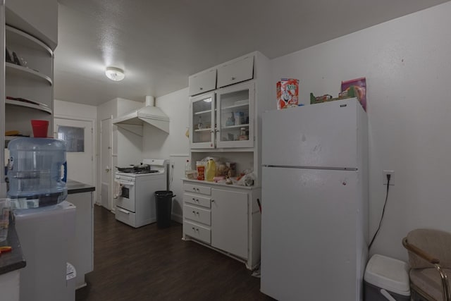 900 N Dotsy Ave, Odessa, TX 79763 - kitchen featuring white appliances, dark wood-type flooring, white cabinetry, glass insert cabinets, and premium range hood
