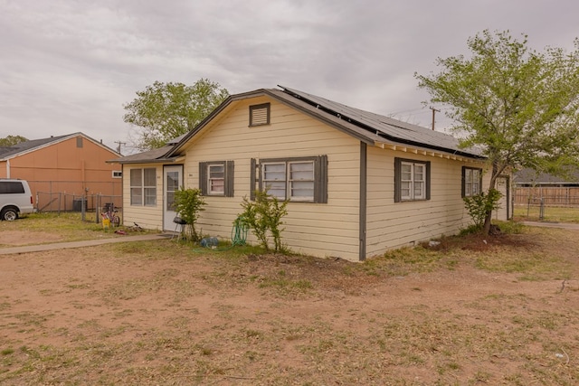 900 N Dotsy Ave, Odessa, TX 79763 - view of front facade featuring solar panels