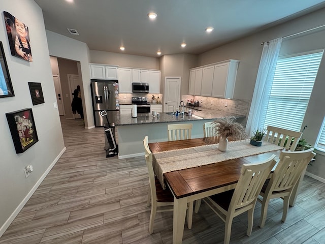 2405 Rio, Midland, TX 79705 - dining space featuring recessed lighting and light wood-type flooring