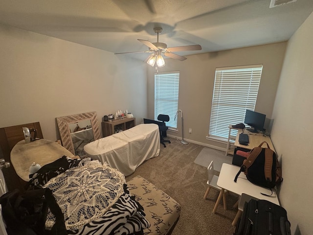 2405 Rio, Midland, TX 79705 - carpeted bedroom with a ceiling fan and baseboards