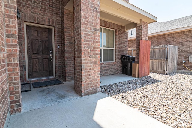 1506 San Miguel Ct, Midland, TX 79705 - doorway to property featuring brick siding