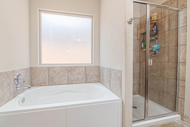 1506 San Miguel Ct, Midland, TX 79705 - full bathroom with a shower stall and a bath