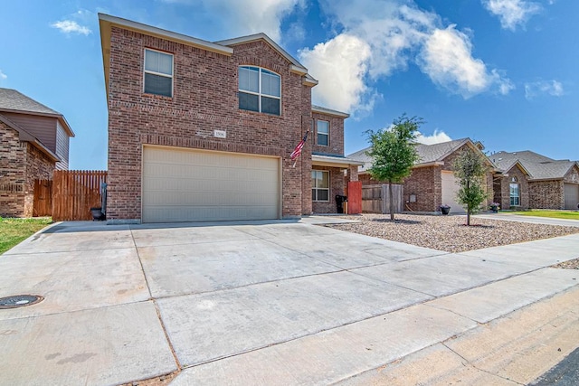 1506 San Miguel Ct, Midland, TX 79705 - traditional home featuring a garage, brick siding, and driveway